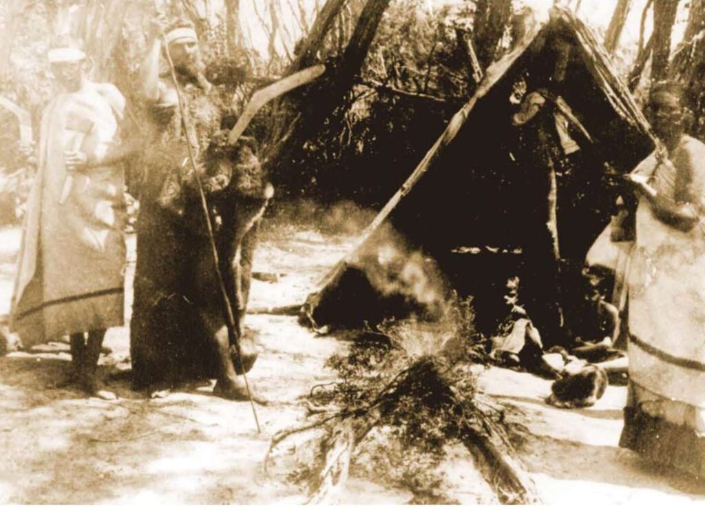 Picture early Indigenous camp