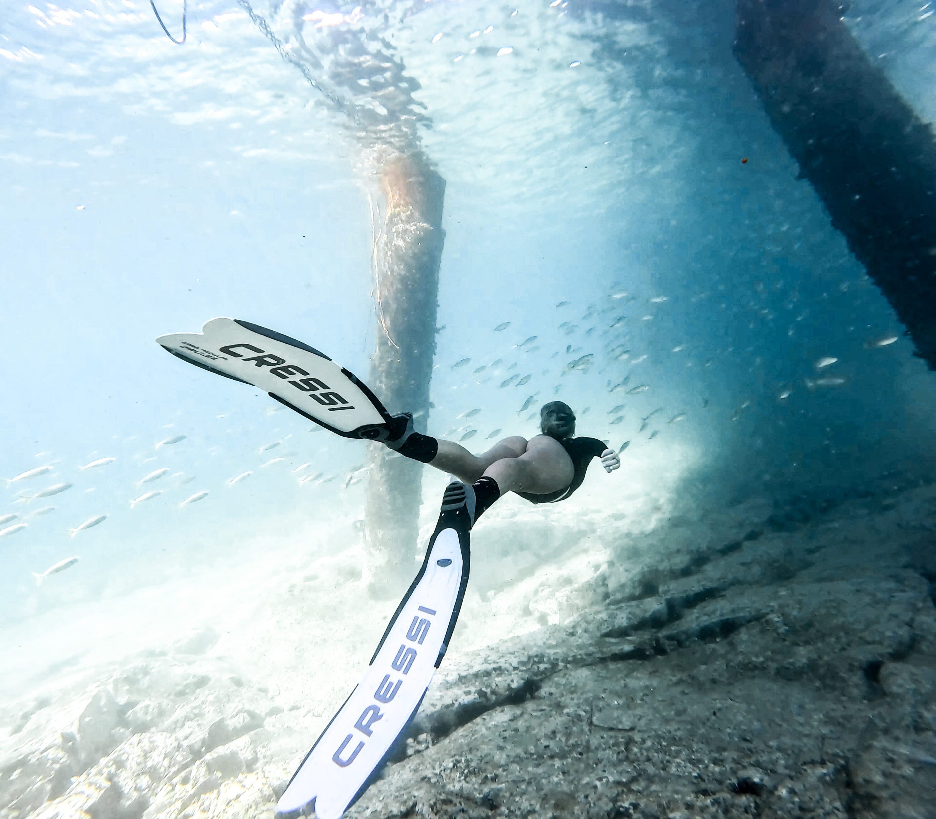 Skye freediving between the Gravel Loader in Shellharbour